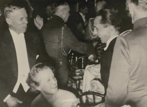 Sigrid Schultz, Ambassador William Dodd, and Nazi propaganda minister Joseph Goebbels photographed together at the Foreign Press Ball. Sigrid Schultz, Ambassador William Dodd, and Nazi propaganda minister Joseph Goebbels photographed together at the Foreign Press Ball.